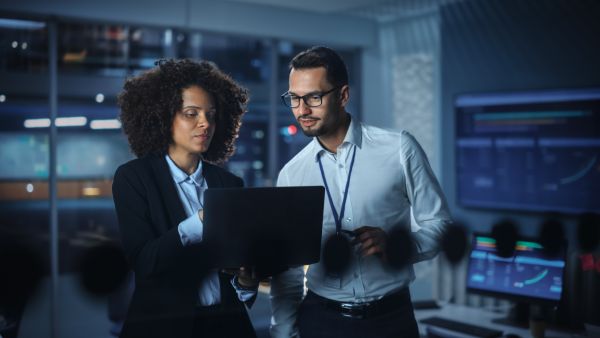 Modern Office: Successful Corporate CEO Working on Laptop and Co